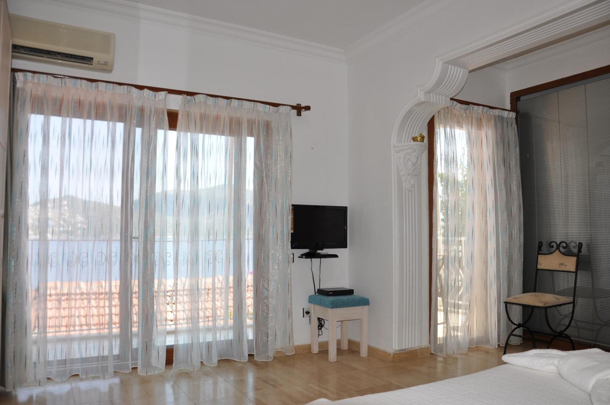 Caretta Hotel Kalkan Quarto foto